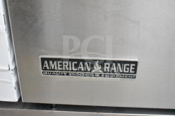 American Range commercial 6-burner gas range with oven, backsplash, and logo. Quality cooking equipment.