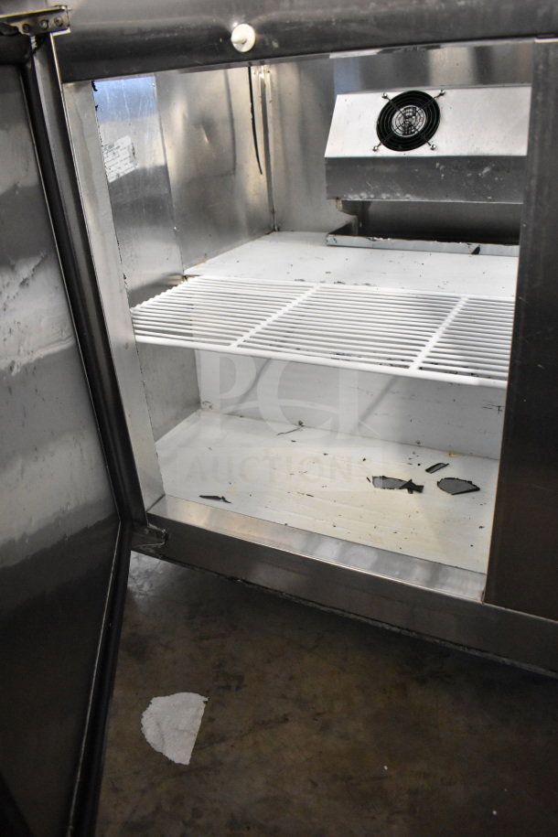 Cooltech CTR-60BMBTG commercial prep table display case, stainless steel interior, visible shelving, worn condition, 115V, 1 phase.