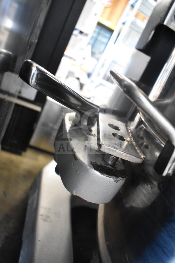 2022 Precision Mixer HD-60 planetary dough mixer lever close-up; shows metal components in good condition.