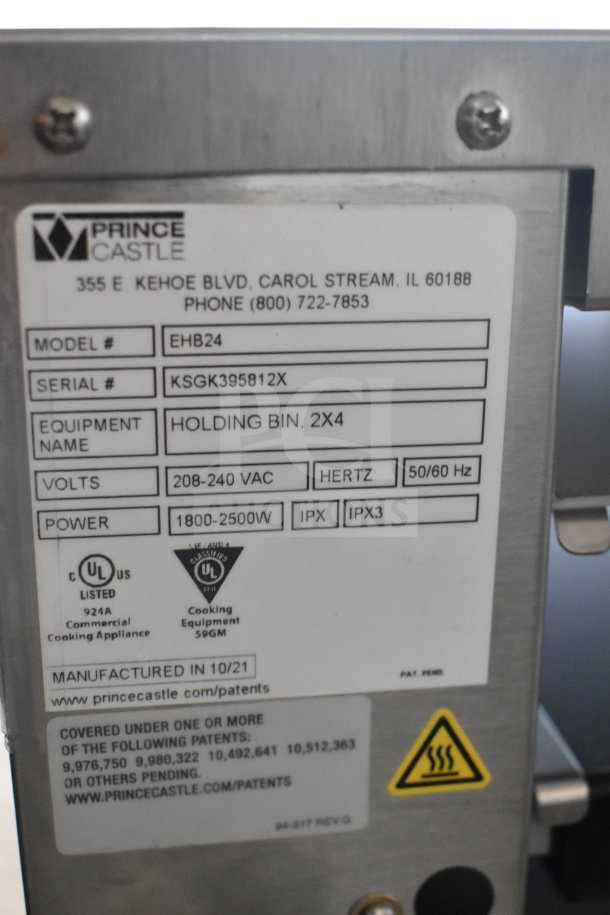 Prince Castle EHB24 holding bin label showing model, serial number, 208-240V, 1800-2500W power, UL certification.