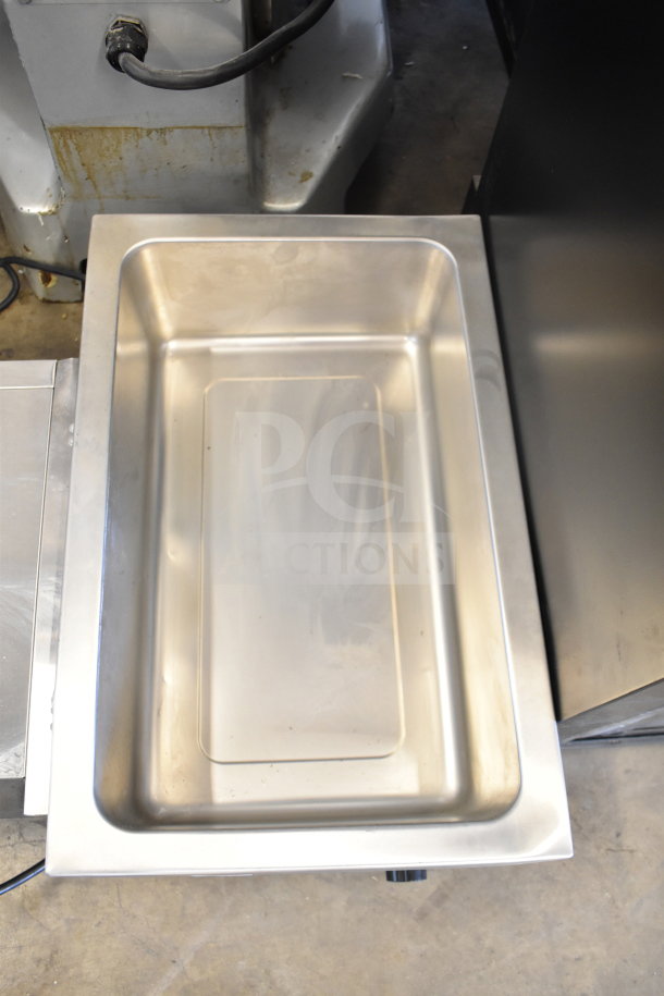 Winco FW-S600 countertop food warmer, stainless steel finish, 120 volts, 1 phase, clean and in good condition.