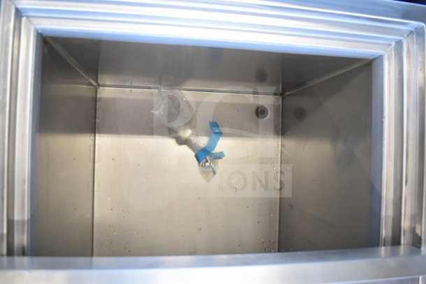 2021 H&K 52473-1 commercial chest freezer interior; clean, stainless steel; 120 volts, 1 phase.