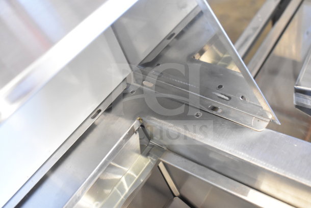 Avantco commercial prep table, stainless steel detail. Durable construction, 115 volts, 1 phase, on commercial casters.