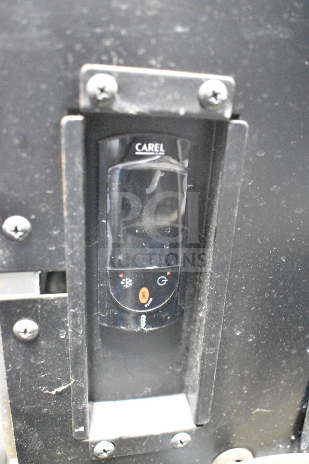 Avantco Commercial Sandwich Salad Prep Table control panel with Carel branding. Features durable construction on commercial casters.