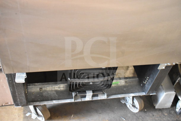 Beverage Air SR1HC-1S reach-in cooler on commercial casters; 115V, 1 Phase. Visible base with attached components.