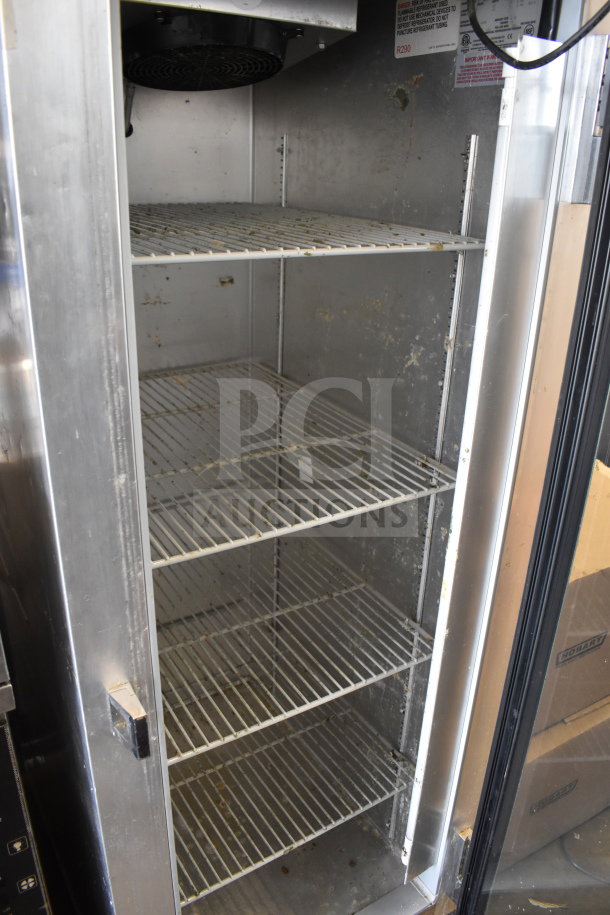 2019 Continental 1RNGD commercial single door reach-in cooler, 115 volts, 1 phase, interior shelving visible, used condition.