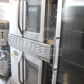 Royal RCOS-1 commercial ovens, natural gas, view-through doors, thermostatic controls, on casters, good condition.