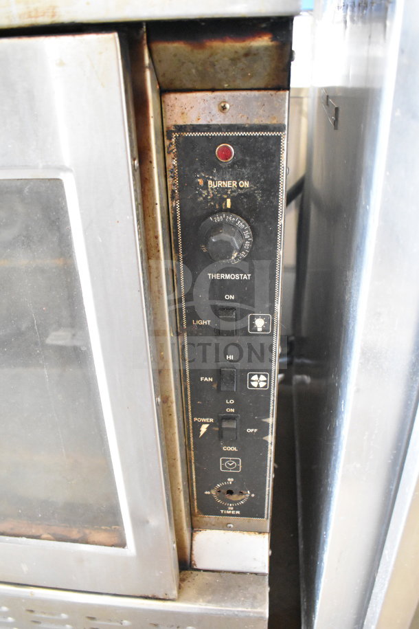 Royal RCOS-1 convection ovens with view and solid doors; thermostatic controls; visible wear; on commercial casters.