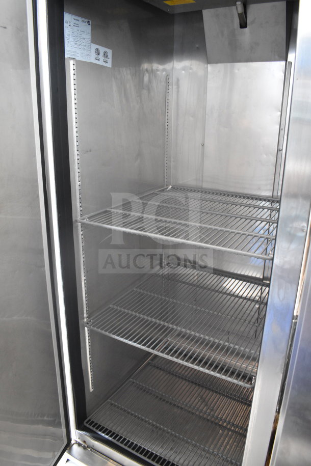 2019 Asber ARF 23 HF commercial single door reach-in freezer, stainless steel interior, 115V, 1 phase, adjustable shelves.