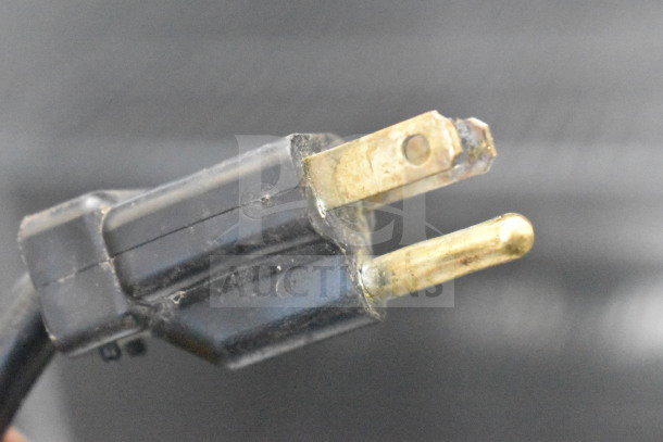 Close-up of a power plug for a 2019 Asber ARF 23 HF Commercial Single Door Reach In Freezer, 115 volts, 1 phase.
