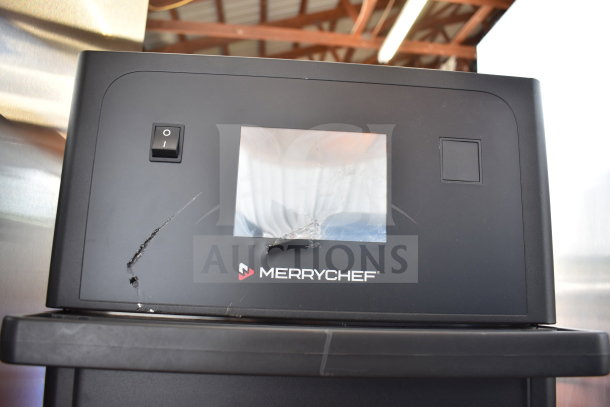 Merrychef eikon e1s commercial oven, visible scratches, power switch, logo, 208/240V, 1 phase, for countertop use.