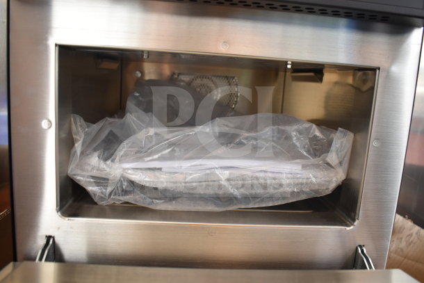 Merrychef eikon e1s electric countertop oven, high-speed, 208/240V, 1 phase, new condition, interior view showing packaging.