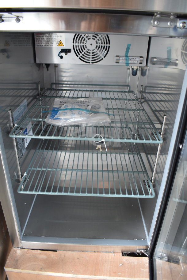 Brand new Avantco 178UBB1GHCS single door back bar cooler with shelves. Scratch and dent model, 115V, 1 phase. Keys included.