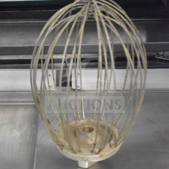 Commercial whisk attachment for Hobart mixer, metal wires, slight wear, excellent for heavy-duty mixing tasks.
