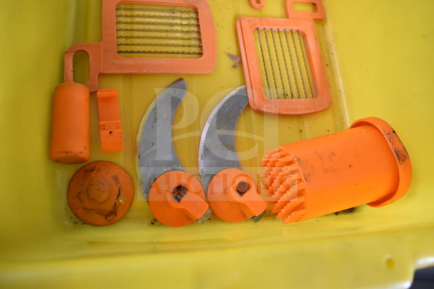Dynacube Countertop Vegetable Cutter accessories, includes blades and grids. Orange plastic and metal parts, used condition.