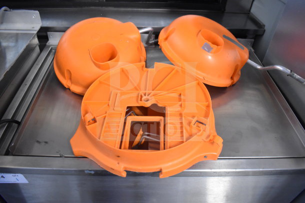 Dynacube Countertop Vegetable Cutter with orange accessories, in good condition, shown on a stainless steel surface.