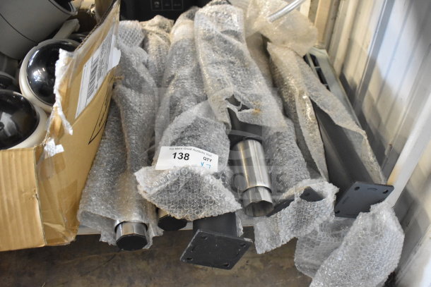 7 brand new legs in bubble wrap, labeled "138," with a "scratch and dent" condition. Ideal for DIY projects.