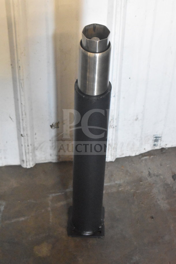 Industrial metal leg, scratch, and dent condition, black with silver top, sturdy construction.