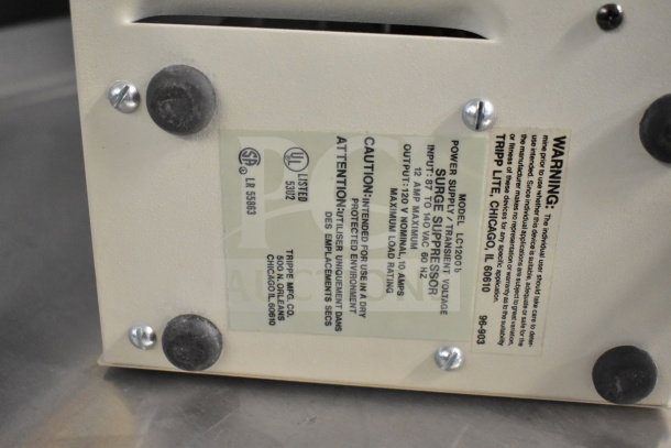 LC-1200 Line Conditioner by Tripp Lite with voltage surge suppressor, UL listed. Input: 120V AC, Output: 120V, 10A max.
