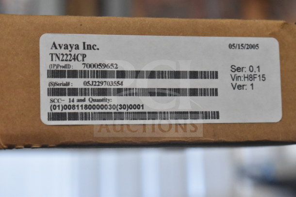 Two Avaya TN2224CP circuit boards in box. Label shows ProdID 700059652, Serial 05J229703554, dated 05/15/2005.