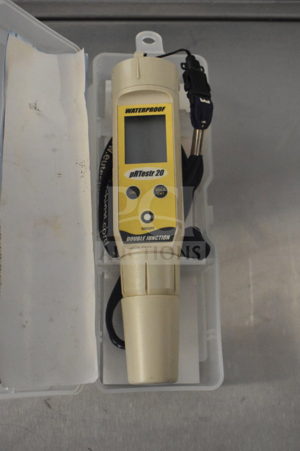 Waterproof pHTestr 20 Double Junction device in yellow, featuring CAL and HOLD/ENT buttons, in protective case, good condition.