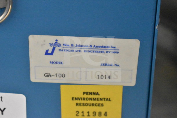 Close-up of GA-100 Radon Monitor label by Wm. B. Johnson & Associates Inc., showing model GA-100, serial number 1014.
