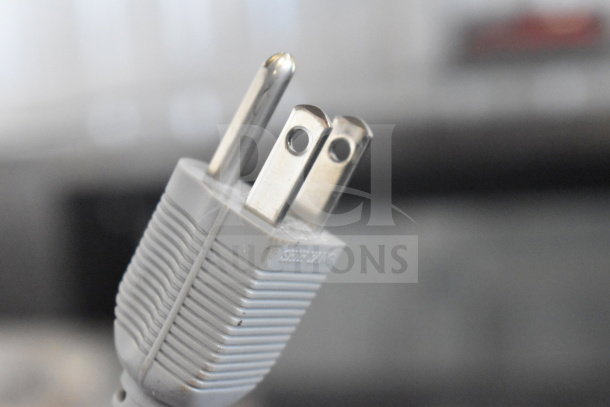 Close-up of the electrical plug for the American International Electric AIE-305 Impulse Sealer, 220 Volts.