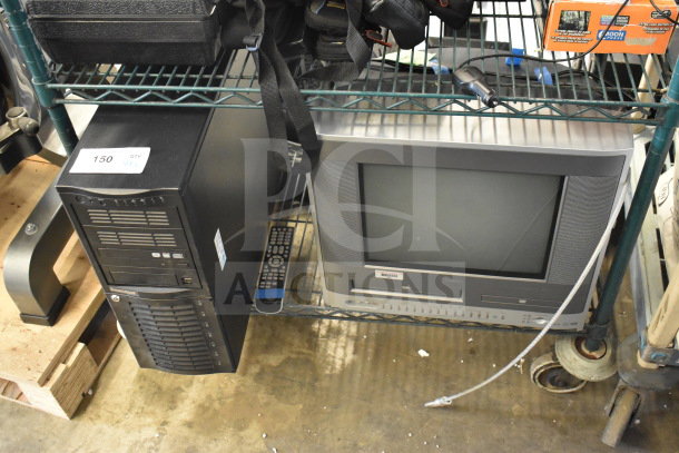 Toshiba MW14F51 TV monitor and computer tower on a shelf. Good condition. Includes remote. Label indicates lot 150.