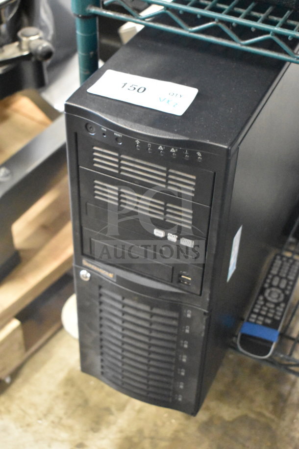 Computer tower with front panel drives, Toshiba MW14F51 monitor not visible. Good condition with lot tag "150 QTY 2X".