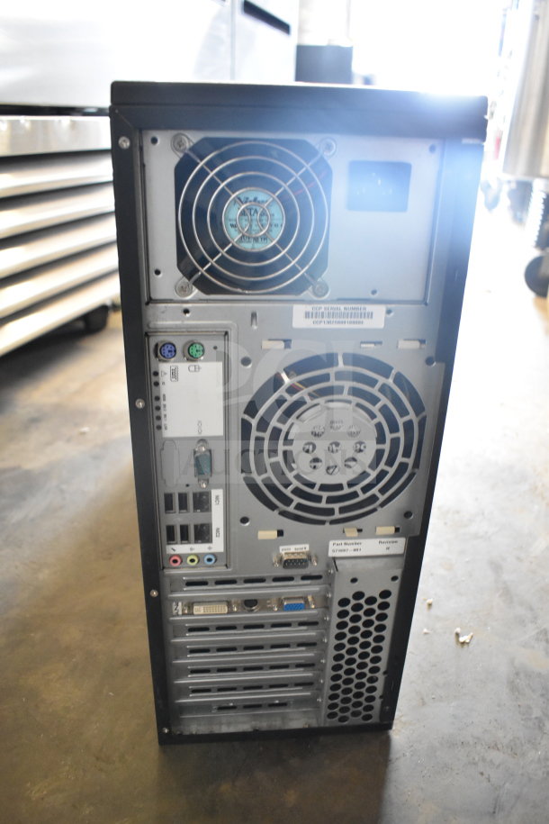 Computer tower back panel showing various ports and fans, part of auction including Toshiba MW14F51 monitor.