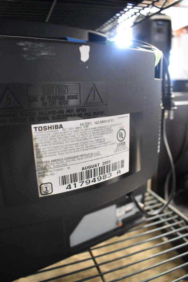 Toshiba MW14F51 monitor back view with label showing model and manufacturing date, August 2005.