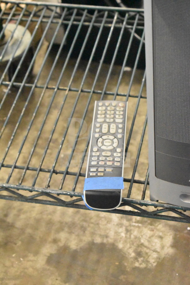 Toshiba MW14F51 monitor and computer tower on metal shelf, includes remote. Slight wear visible.