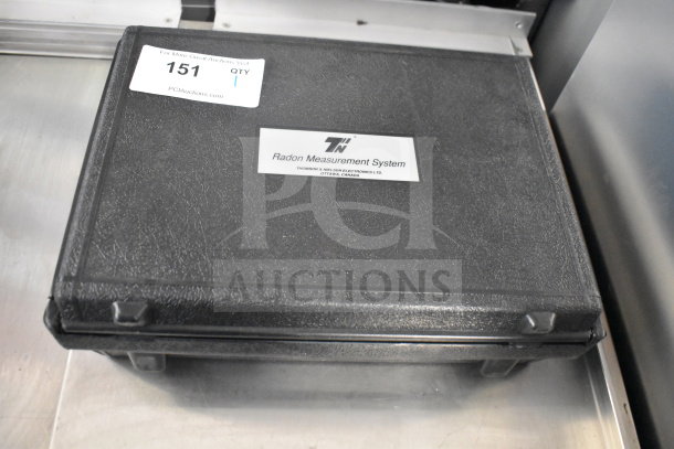 Radon Measurement System case, black with label indicating "Radon Measurement System" by Thomson & Nielsen Electronics Ltd.