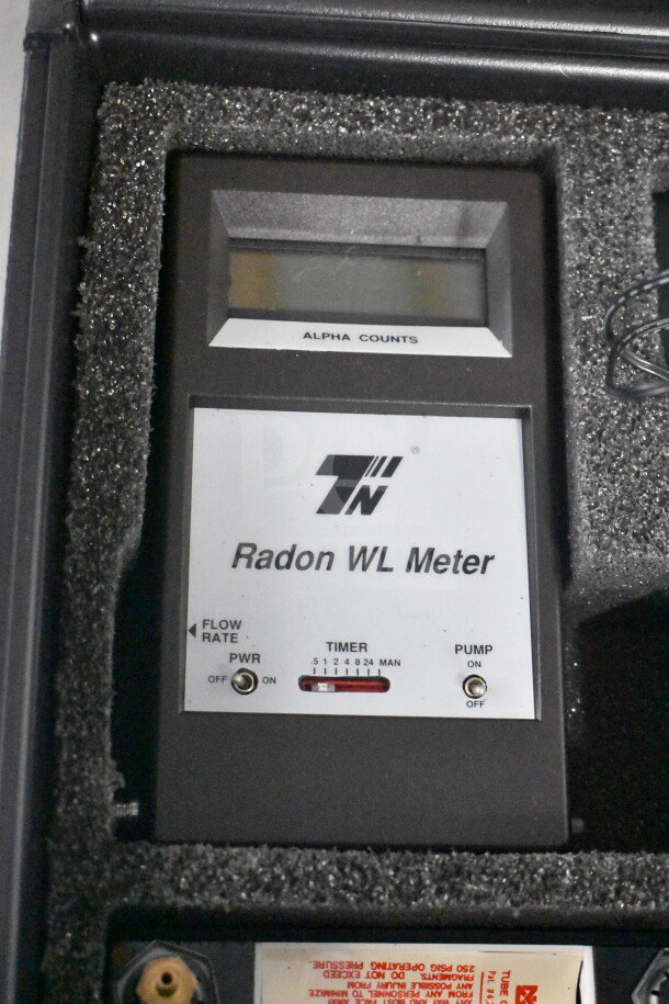 Radon Measurement System with Radon WL Meter; features alpha count display, timer, and flow rate/pump controls.