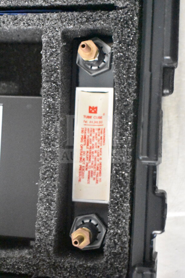 Radon Measurement System with WL Meter and Data Recorder in foam casing. TubeCube label with patent info visible.