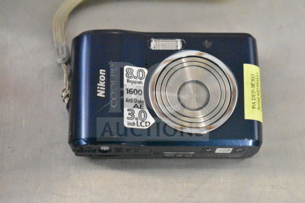 Nikon Coolpix L26 digital camera, 8.0 MP, ISO 1600, 3.0" LCD, Anti-Shake feature, original box included, gently used condition.