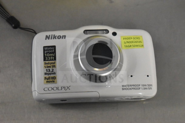 Nikon Coolpix S32 digital camera, 13.2 MP, waterproof 10m, shockproof 1.5m, original box, full HD, model with tags.