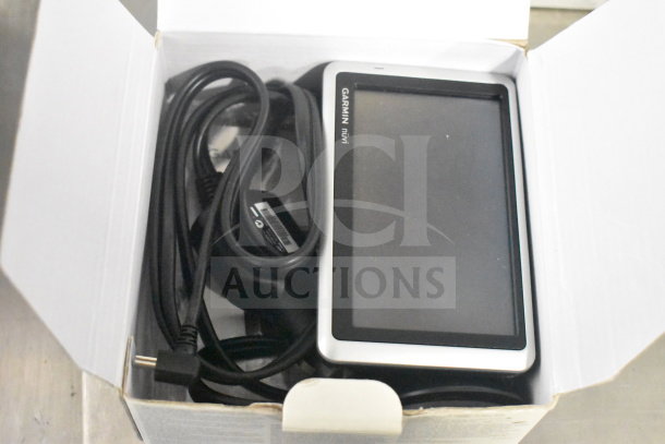 Garmin GPS devices, Nuvi 1350 and 1390 models, in original box with cords. Excellent condition.