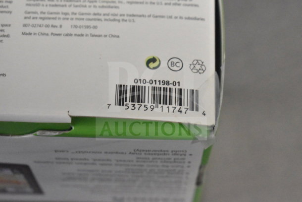 Boxed Garmin GPS units featuring Nuvi 55, Nuvi 40, Nuvi 1350. Barcode visible, indicating product details.