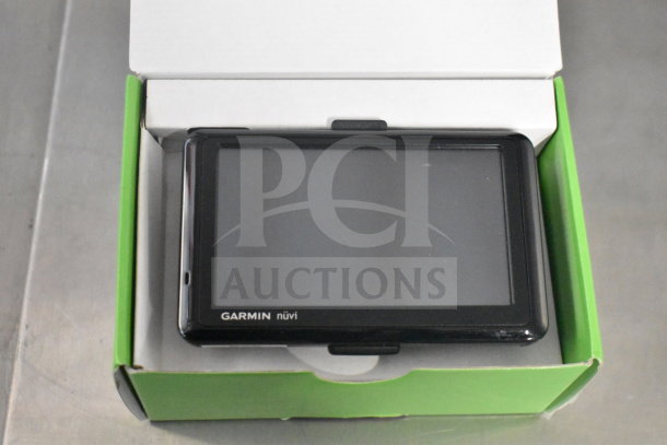 Three Garmin GPS units, models Nuvi 55, Nuvi 40, and Nuvi 1350, in original box. Perfect condition.