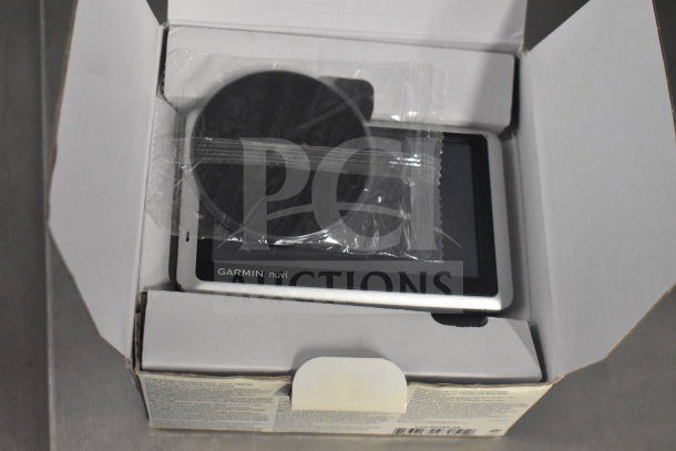 3 Garmin GPS units in original box including Nuvi 55, Nuvi 40, Nuvi 1350. Excellent condition.