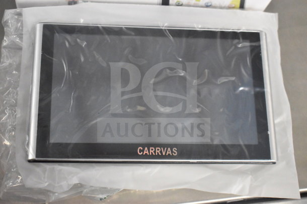 Carrvas X002D2WGVF GPS in original packaging, new condition, features touchscreen, includes two units per bid, visible logo.