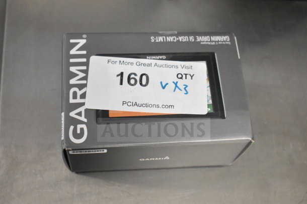 Boxed Garmin GPS, new condition, labeled with auction lot 160 and quantity x3.