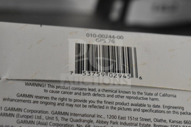 Barcode and warning label on original box for Garmin GPS. Includes model GPS 76, item number 010-00244-00.