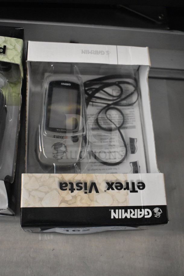 Garmin eTrex Vista GPS in original box, includes cords. Item in excellent condition, potential bid multiplier.