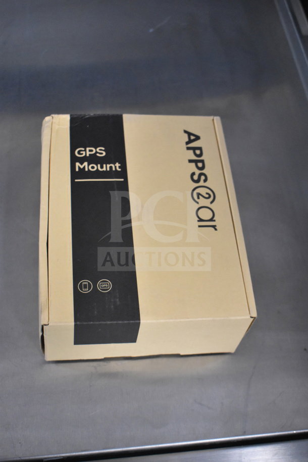 APPS2Car GPS Mount in original box, showcasing packaging and brand. New condition, ideal for secure GPS placement.