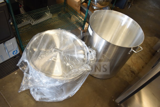 Two brand new heavy-duty aluminum stock pots, 160 Qt and 100 Qt, with minor scratches. Suitable for commercial use.