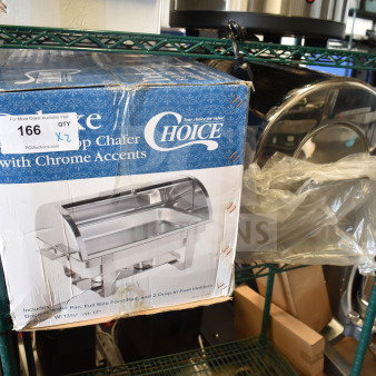 Two brand new Choice Deluxe 8 Qt. Roll Top Chafers, with chrome accents, in original packaging, slight box wear visible.
