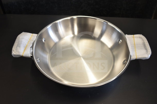 4 new Vigor SS1 Series 9.5" stainless steel fry pans with aluminum-clad bottom, dual handles, scratch and dent condition.