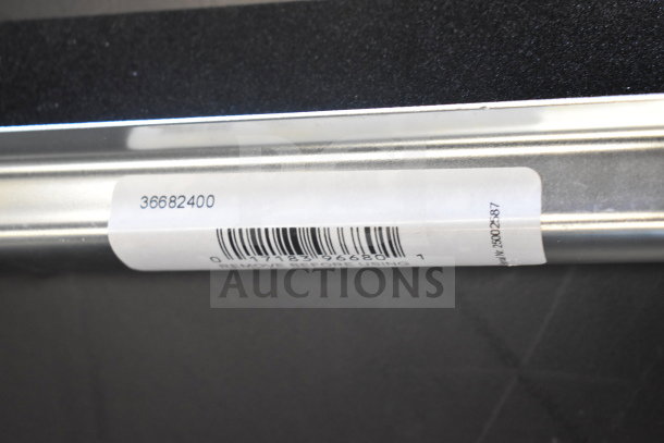 Carlisle Flo-Pac 22" black double foam squeegee, metal frame, item 36682400, barcode visible, new scratch and dent condition.